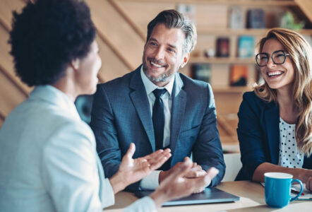Business persons talking in the office