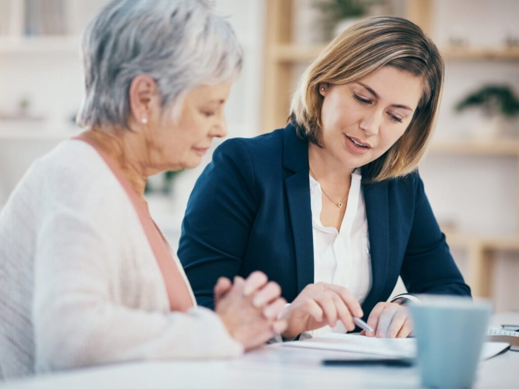 Financial adviser assisting women