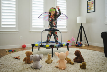 Girl jumping on a trampoline