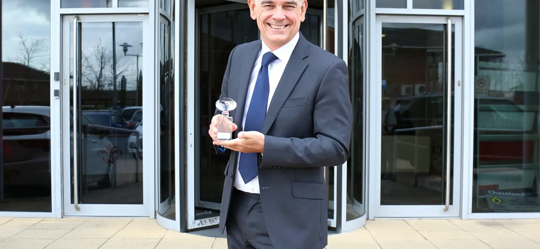 Ian Mattioli receiving award