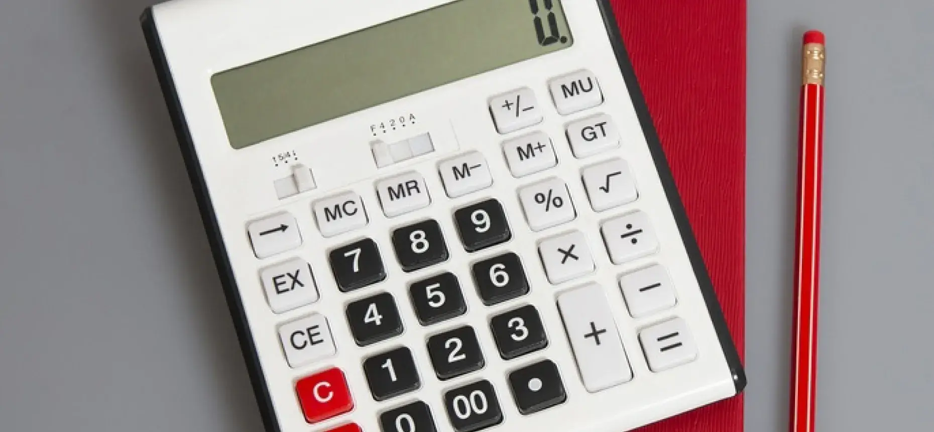 calculator and red pencil