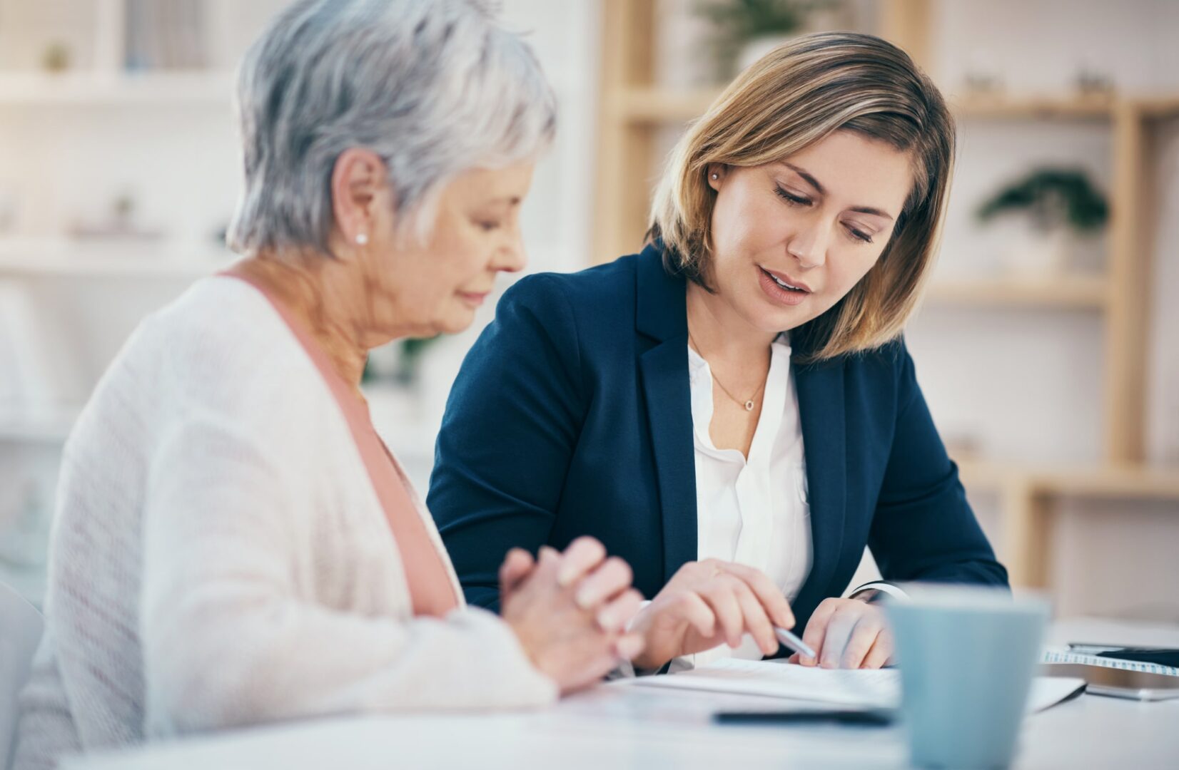Financial adviser assisting women